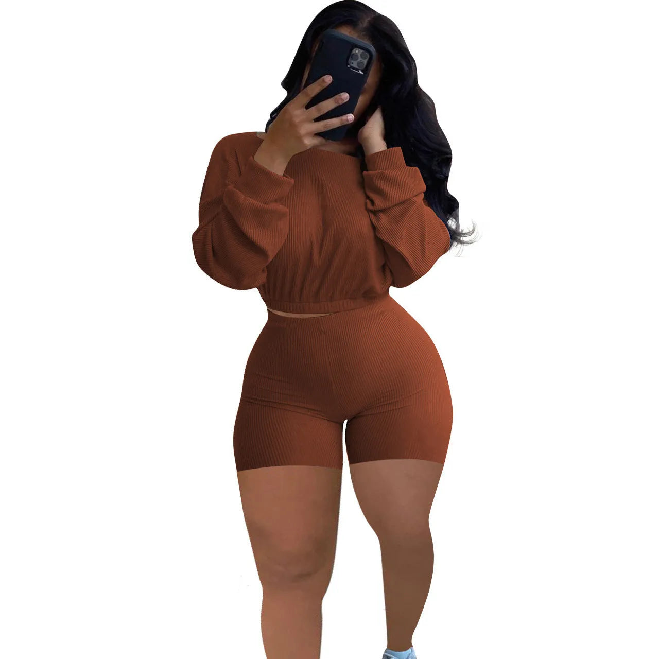 Sunken stripe solid colour off-the-shoulder long sleeve top and shorts two-piece set on a hanger.