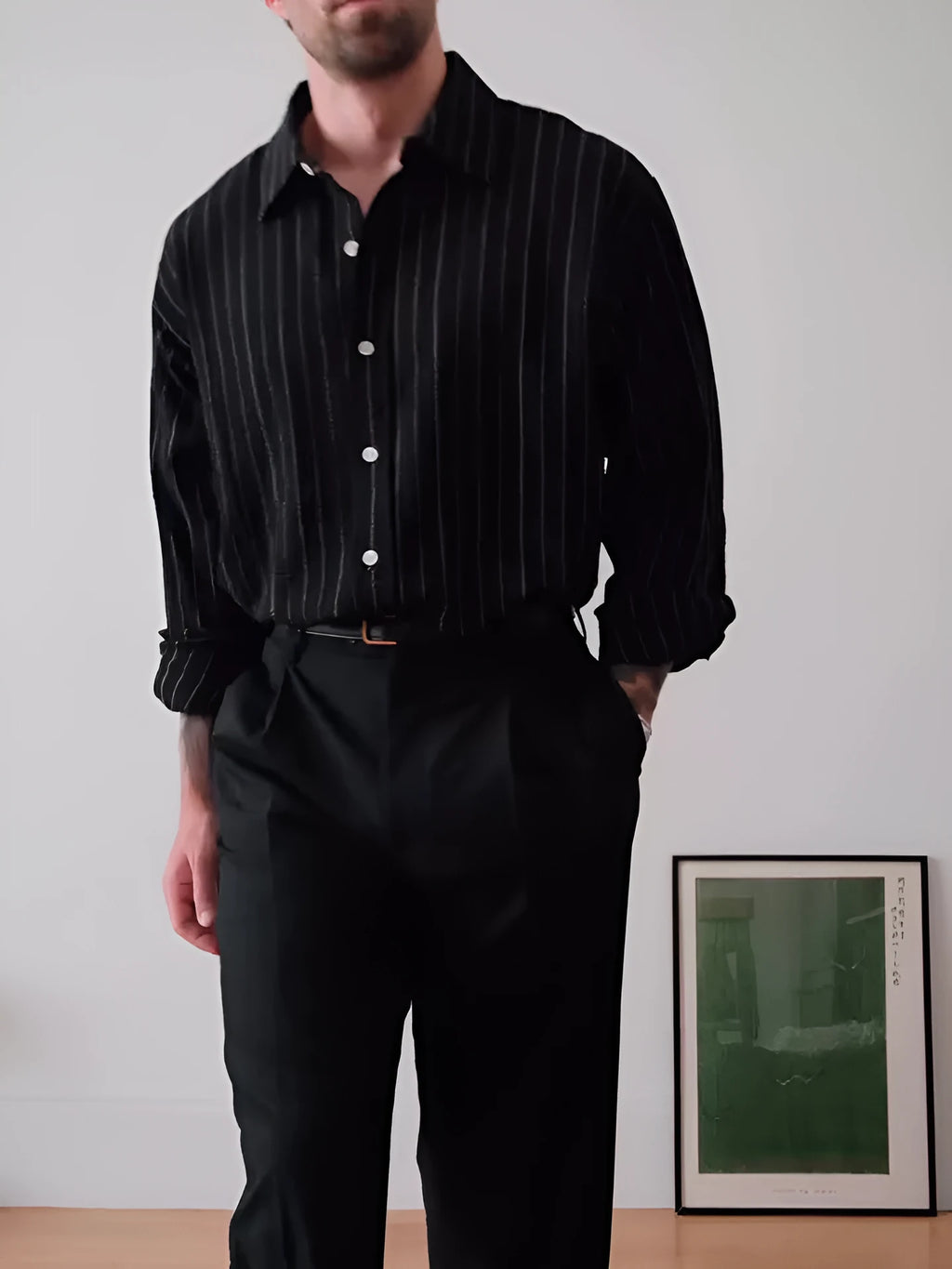 Men's black pinstriped long sleeve button-down shirt with a regular fit.
