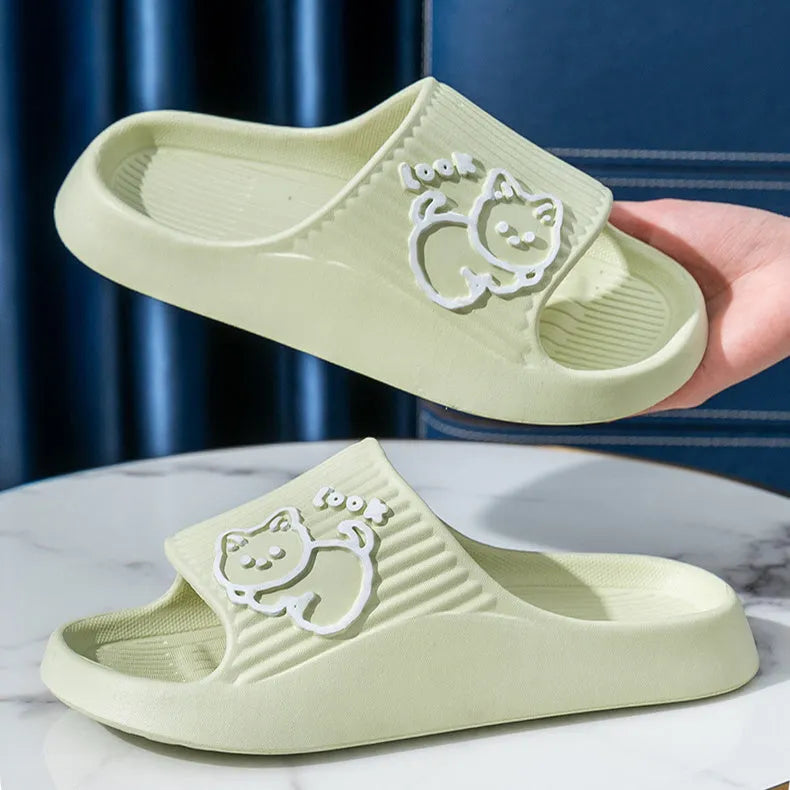 Women's green cat slippers with thick EVA platform sole, shown from above.