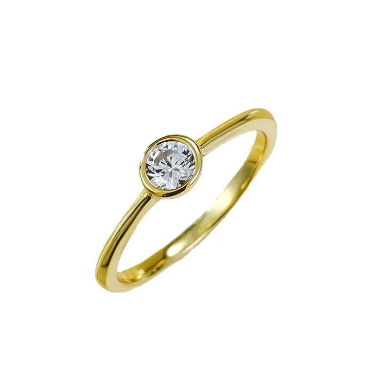 Minimalist silver crown ring with line design in gold or platinum finish on a size guide