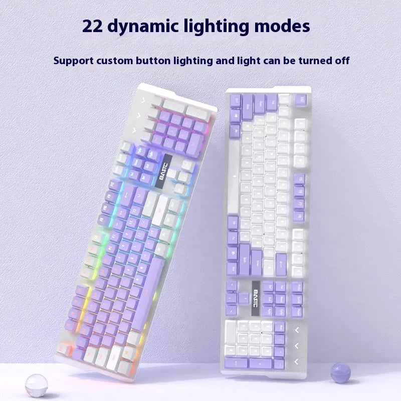 Purple and white mechanical keyboard and wired mouse set with backlit keys on a desk.