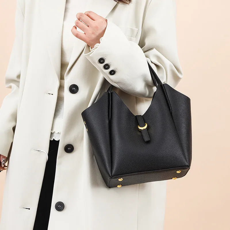 Genuine leather women's retro bucket bag in beige with top handle and sandwich pocket