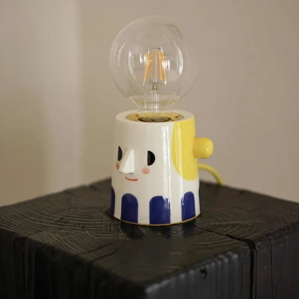 Handmade ceramic table lamp with ball headlight finish for bedside decoration