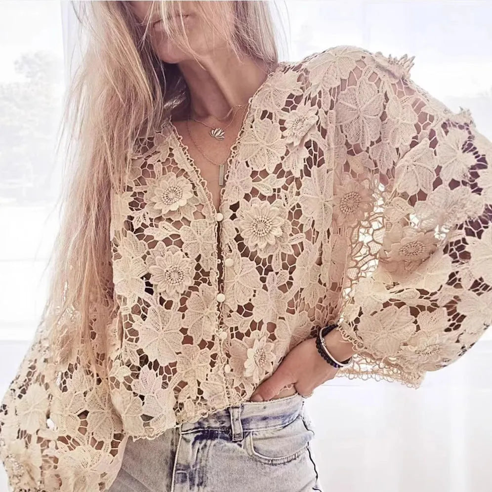 Women's black V-neck lace cardigan blouse with hollow long sleeves and three-dimensional decoration.