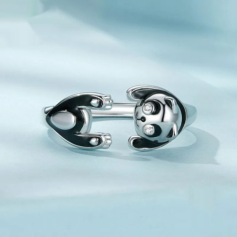 Adjustable sterling silver panda ring bracelet with white gold plating and drip oil finish.
