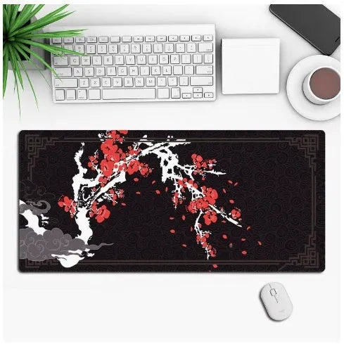 Custom anime graphic gaming mouse pad with non-slip rubber base on a desk.