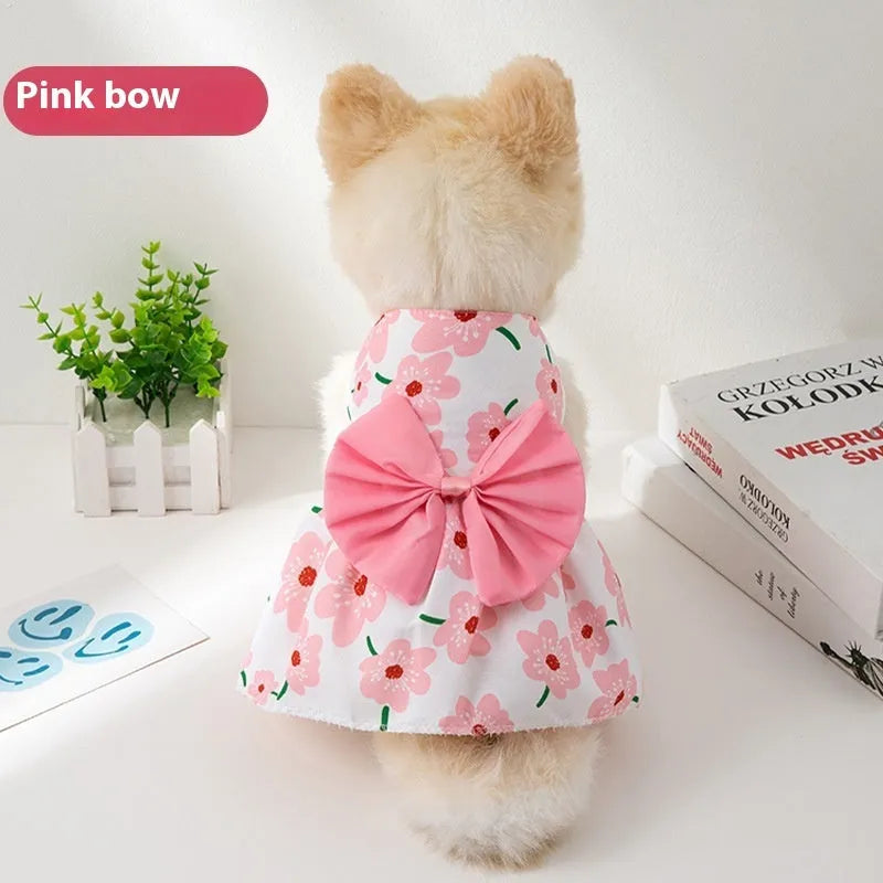 Ultra-thin floral butterfly knot princess dress for dog or cat on a hanger, showing bow colour options.