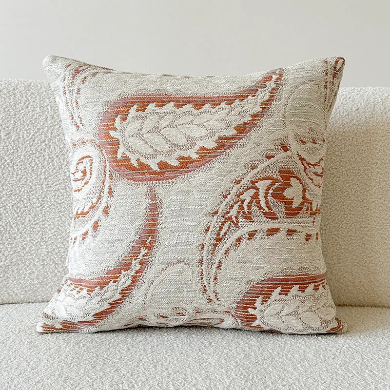 Amber jacquard paisley patterned sofa cushion cover with botanical floral design.
