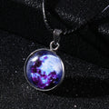 Luminous constellation pendant necklace with adjustable chain on a plain background.