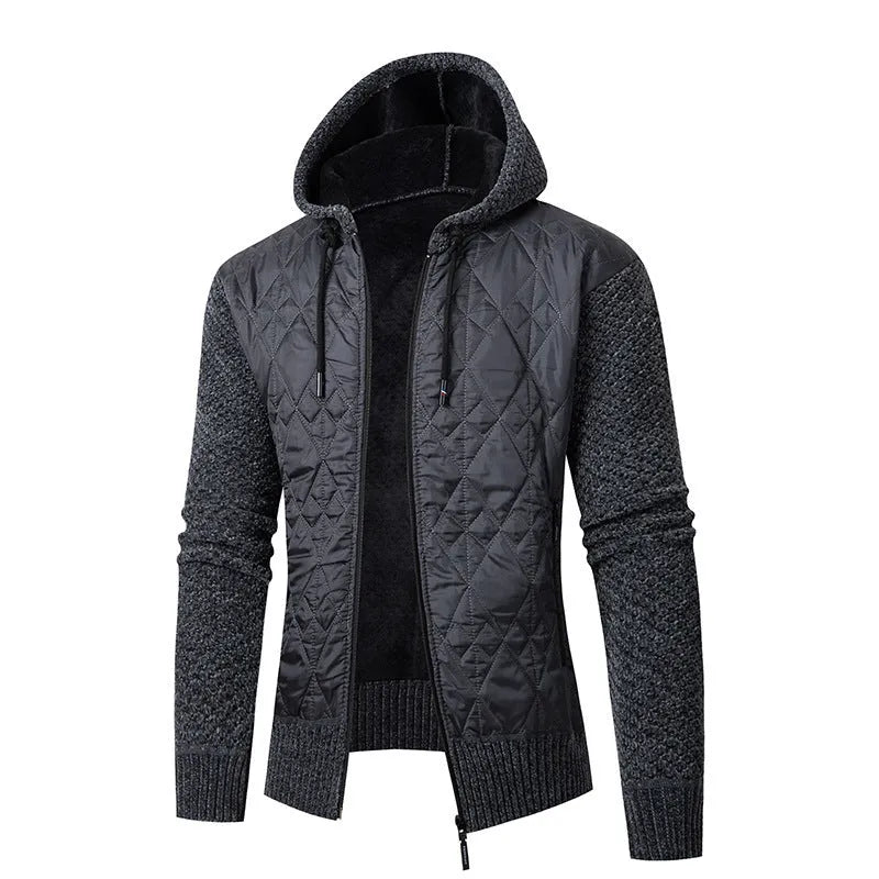 Man wearing a grey hooded zip-front cardigan made of textured wool corduroy with a cinched waist.