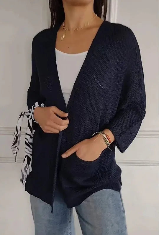 Women's thin waffle knit cardigan coat with nine-quarter sleeves and front pockets in army green.