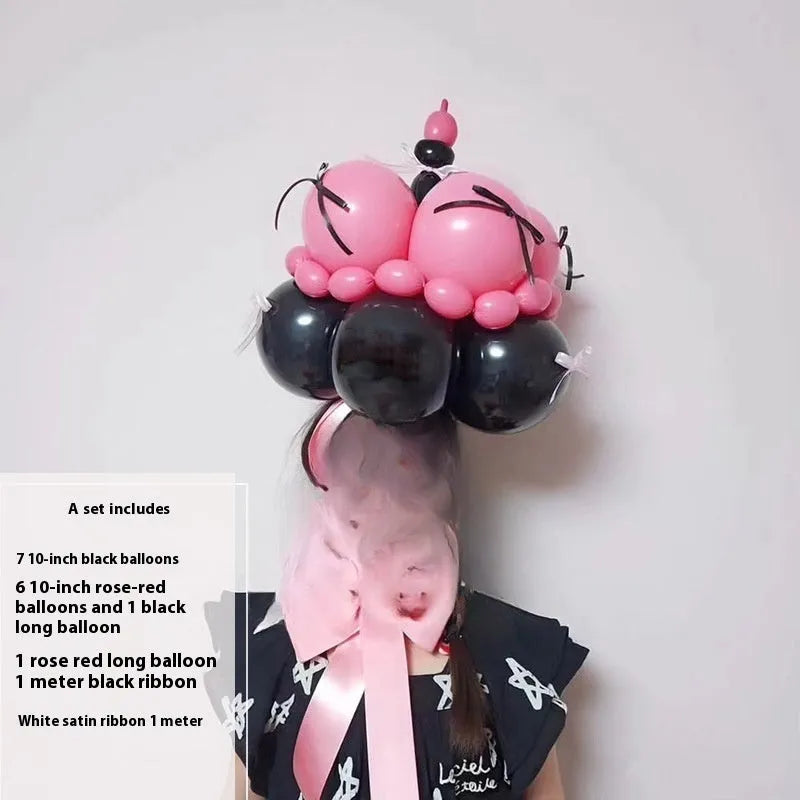 DIY balloon bouquet decoration kit with round balloons for cake toppers, showing one complete set.