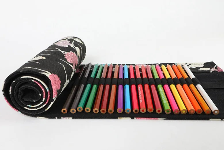 Square canvas pencil case with ballet girl print, shown open to display rolling storage for multiple pencils.