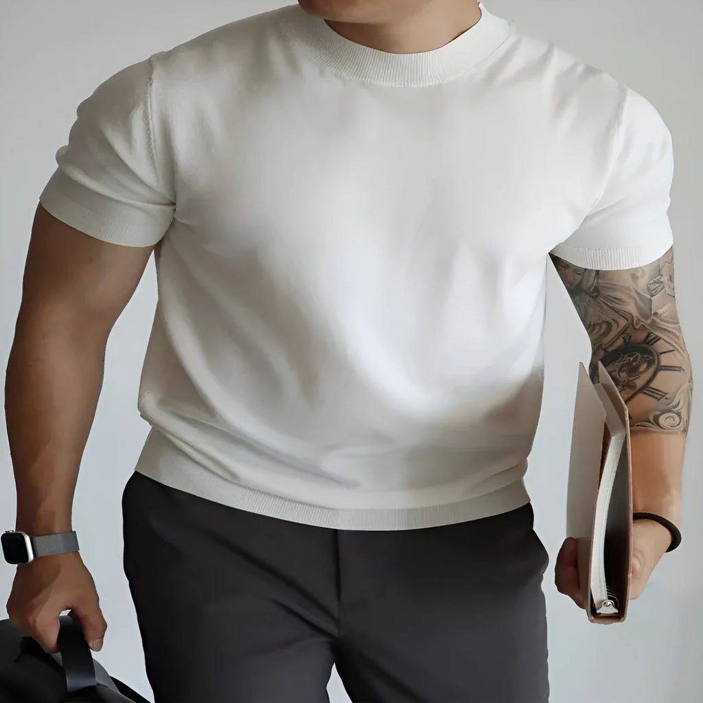Men's slim-fit solid colour t-shirt on a hanger, available in multiple colours including black, navy, and camel.