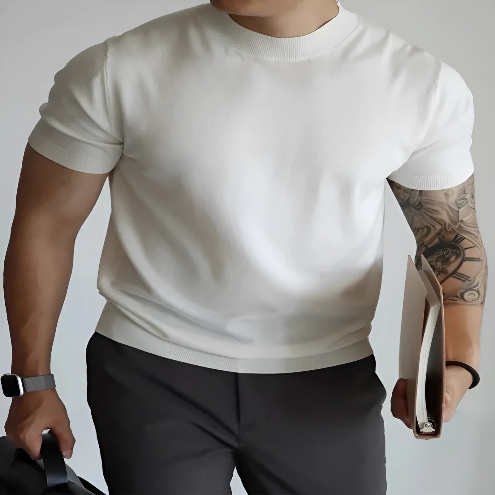Men's slim-fit solid colour t-shirt on a hanger, available in multiple colours including black, navy, and camel.