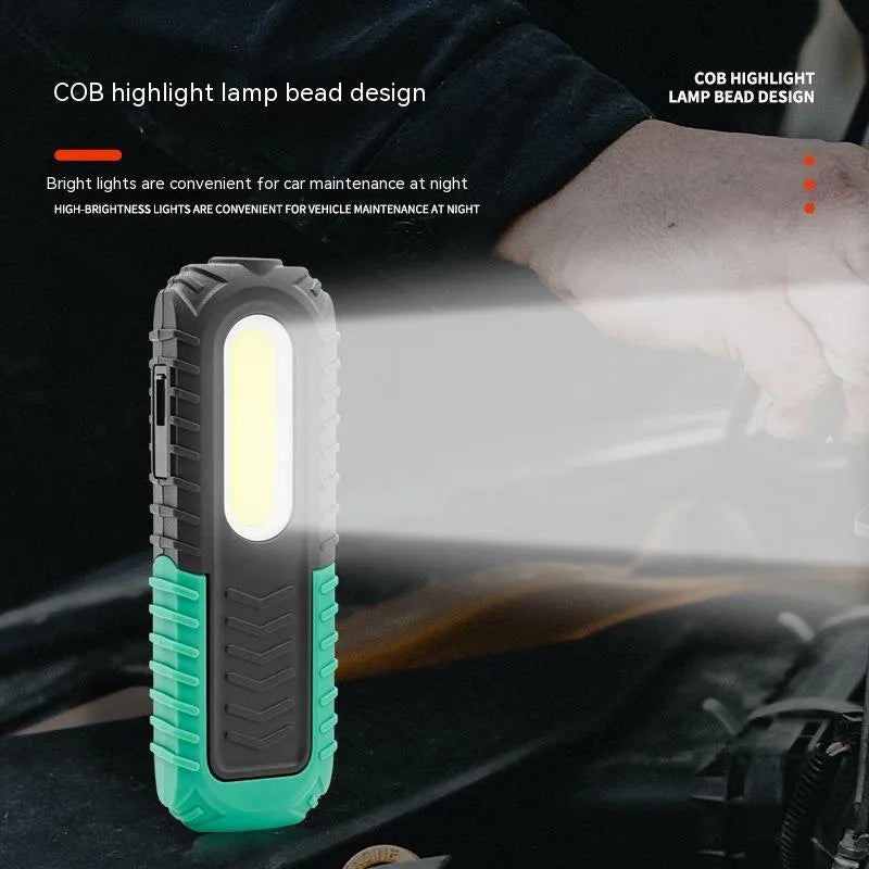 Black and green USB rechargeable auto repair work light with PET coating for drop resistance
