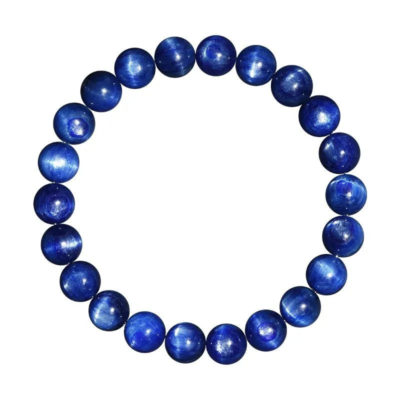 Natural blue crystal ball bracelet with geometric shape and Ruyi detail on a white background.