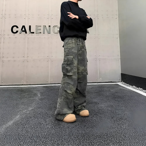 American vintage washed camouflage cargo pants with multiple pockets on a mannequin.