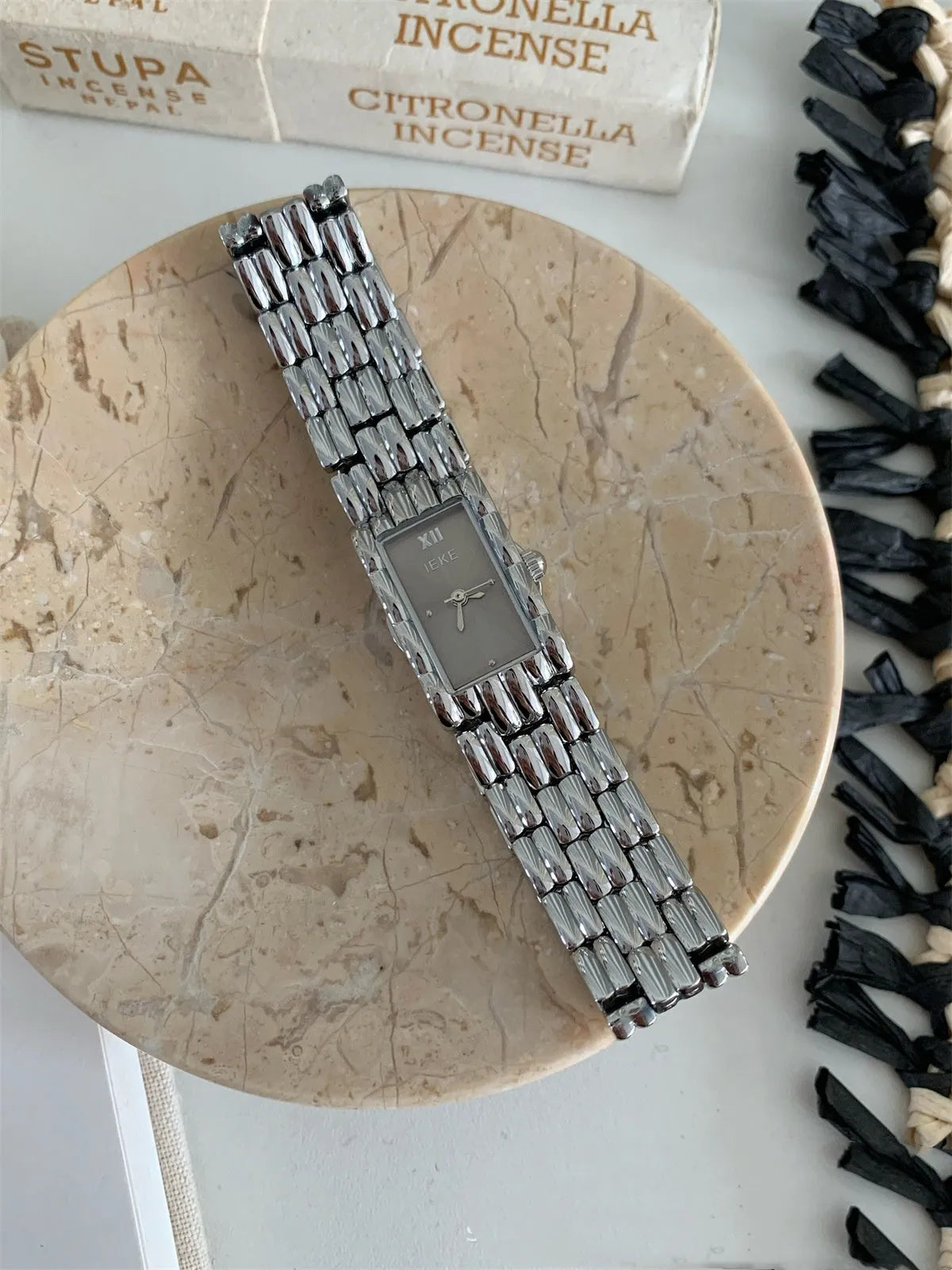 Women's stainless steel bracelet watch with 15mm dial and butterfly buckle