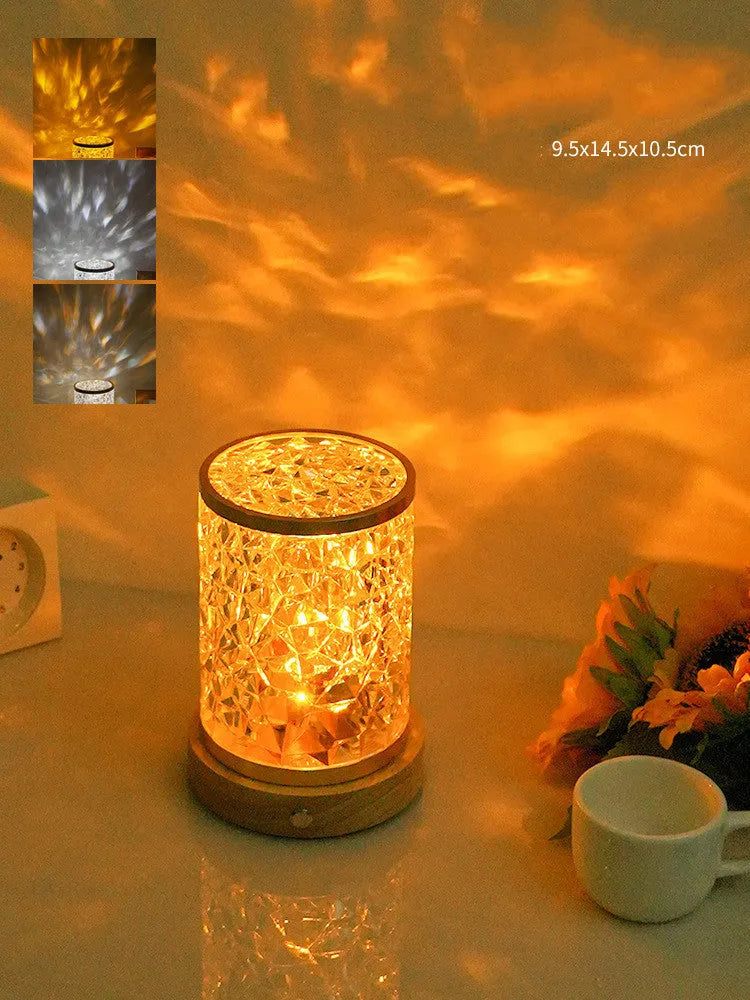 Rotating water ripple night light with acrylic dome on a solid wood base.