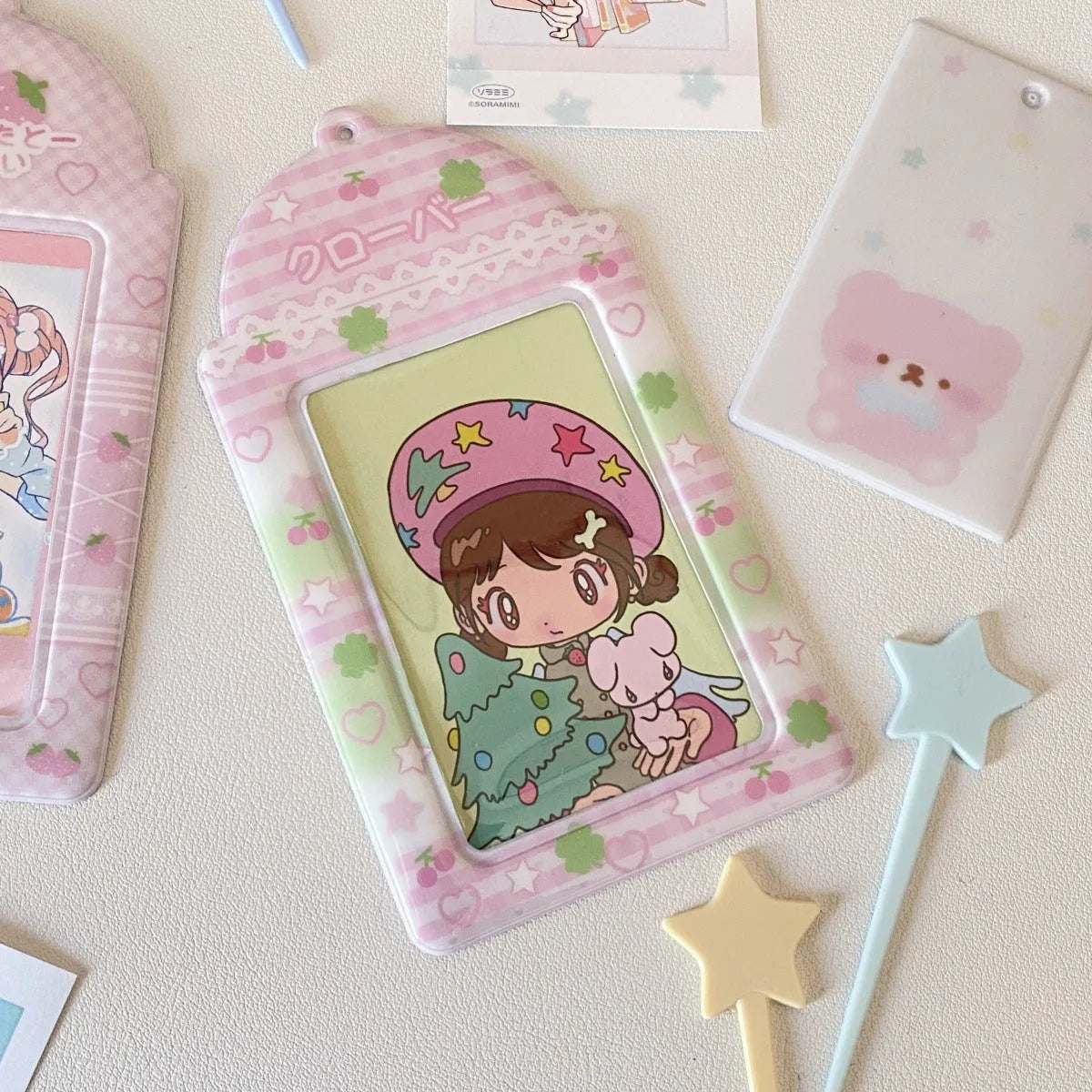 Cartoon strawberry design PVC meal card holder measuring 7.6cm by 13.6cm