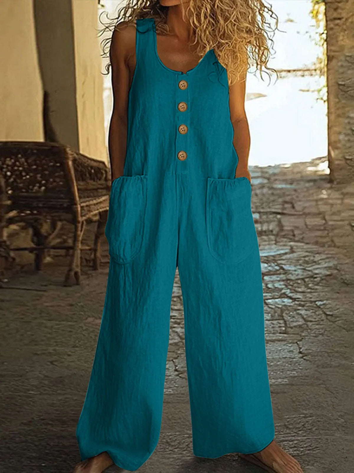 Sleeveless wide-leg cotton jumpsuit in art retro style shown in a selected colour