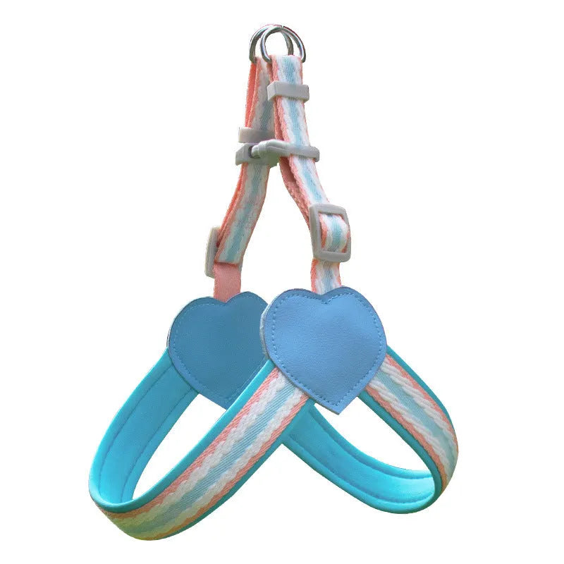Nylon dog walking chest strap vest with an attached hand holding rope, shown in emerald green.