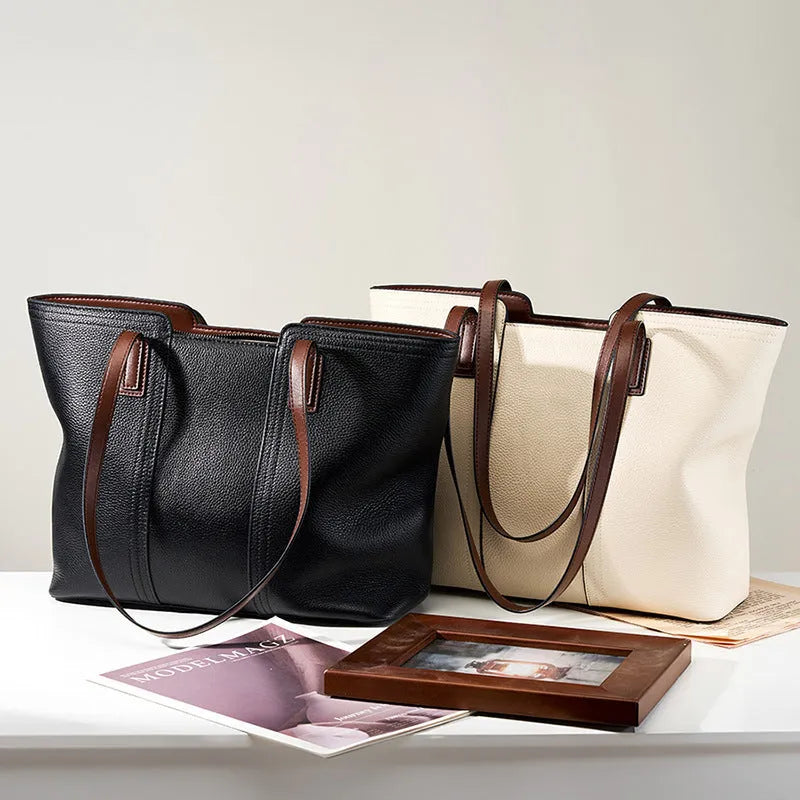 Women's black genuine leather commuter shoulder bag with multiple internal compartments