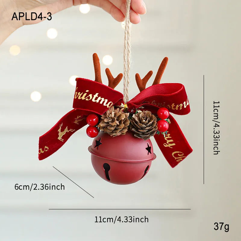 Wrought iron mixed pendant with antlers, bowknot, pine cone, and bell in golden finish