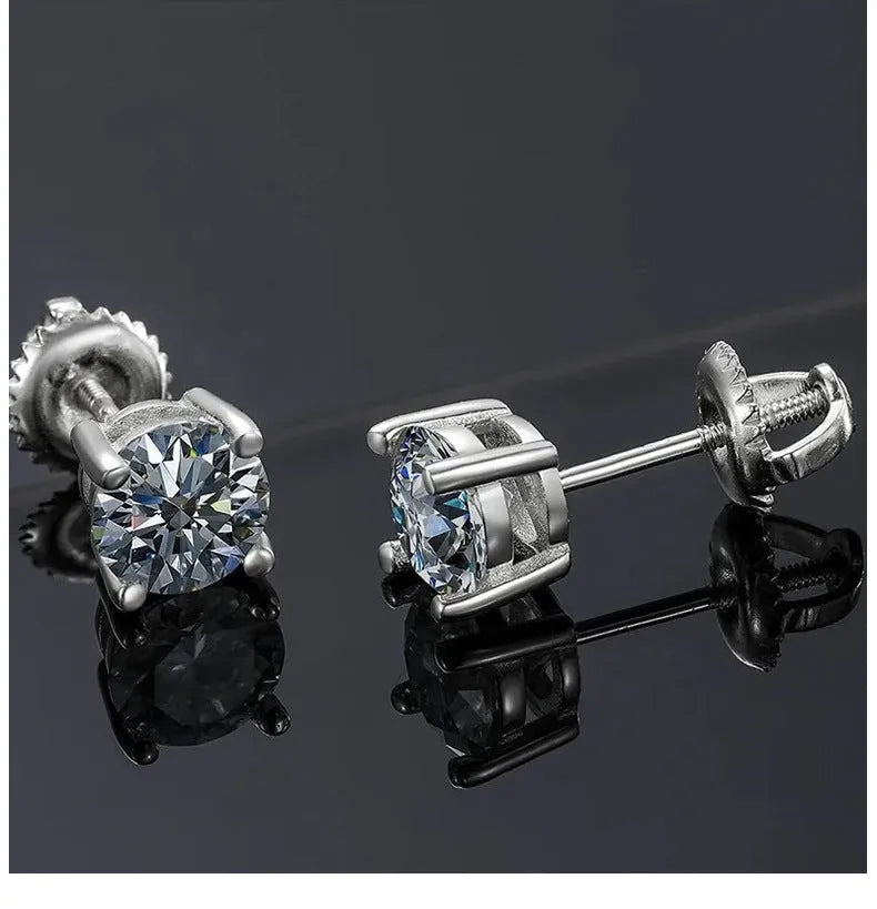 Silver four-claw set moissanite stud earrings with geometric shape and screw-back fittings.
