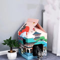 Foldable corrugated paper cat scratching board with Nagoya design, shown both flat and forming a nest.