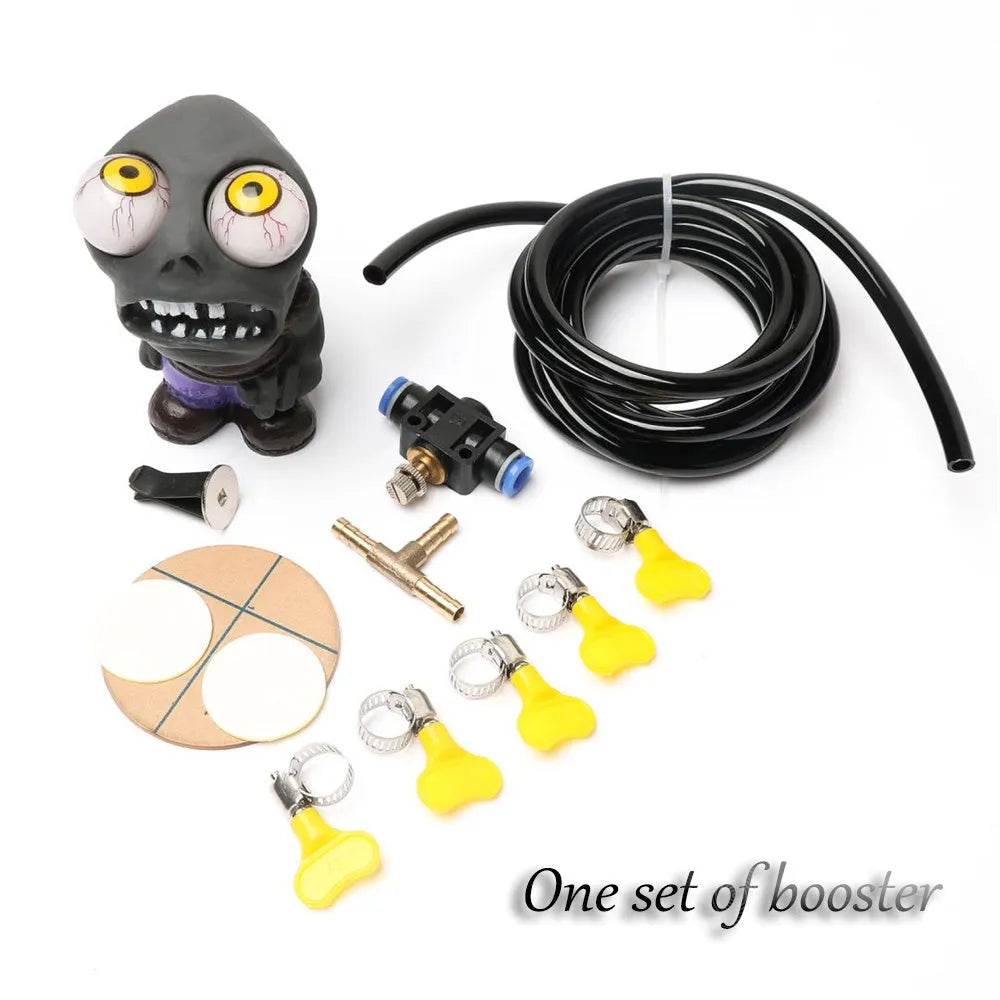 Turbo car decompress ornament kit showing rubber doll, copper three-way tube, pressure valve, and PU tubing on a white background.