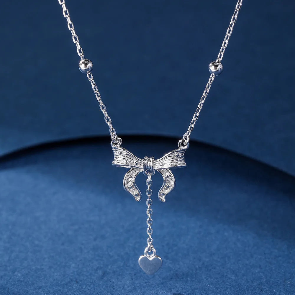 S925 sterling silver necklace with butterfly heart bow pendant on adjustable O-ring chain
