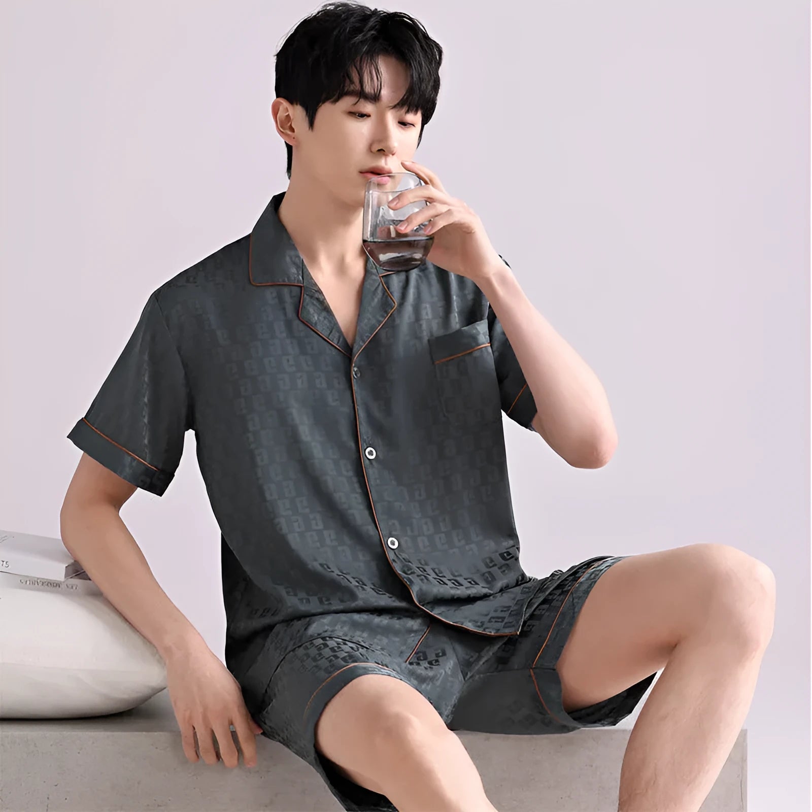 Men's ice silk summer pyjama set in cardigan style with short pants, shown in satin jacquard pattern