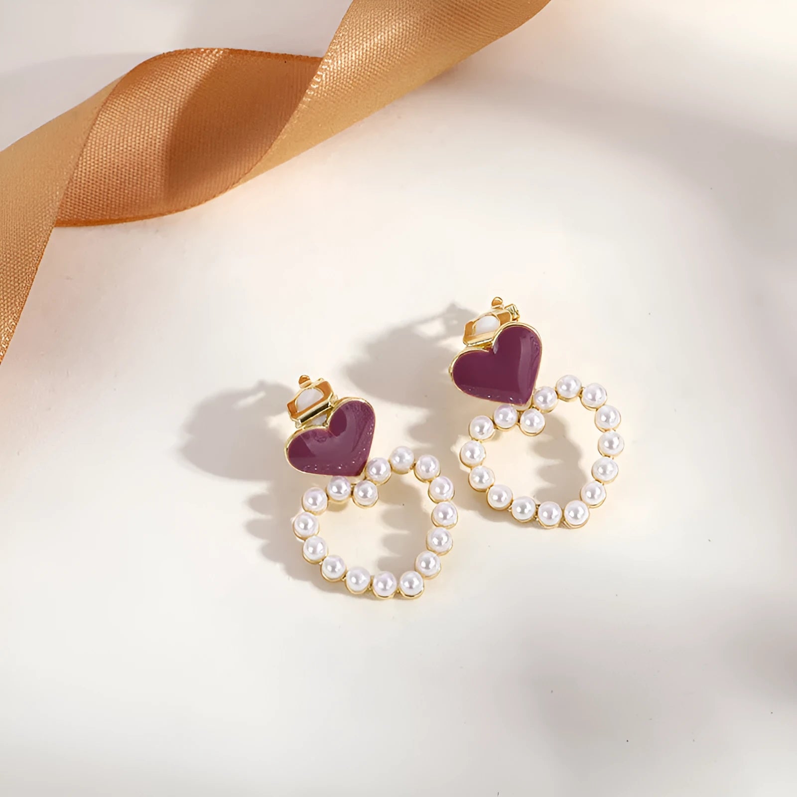 Gold geometric tassel clip-on earrings for women without piercings.