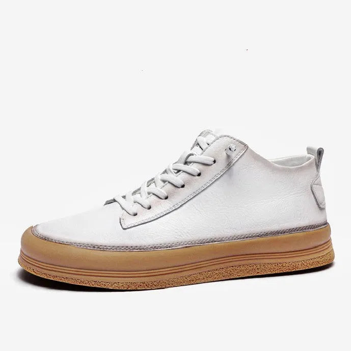 Men's black casual leather shoes with a round toe and white rubber sole on a plain background.