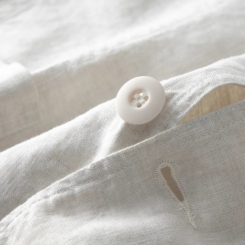 Men's loose fit linen casual blazer jacket on a hanger, shown in a solid colour.