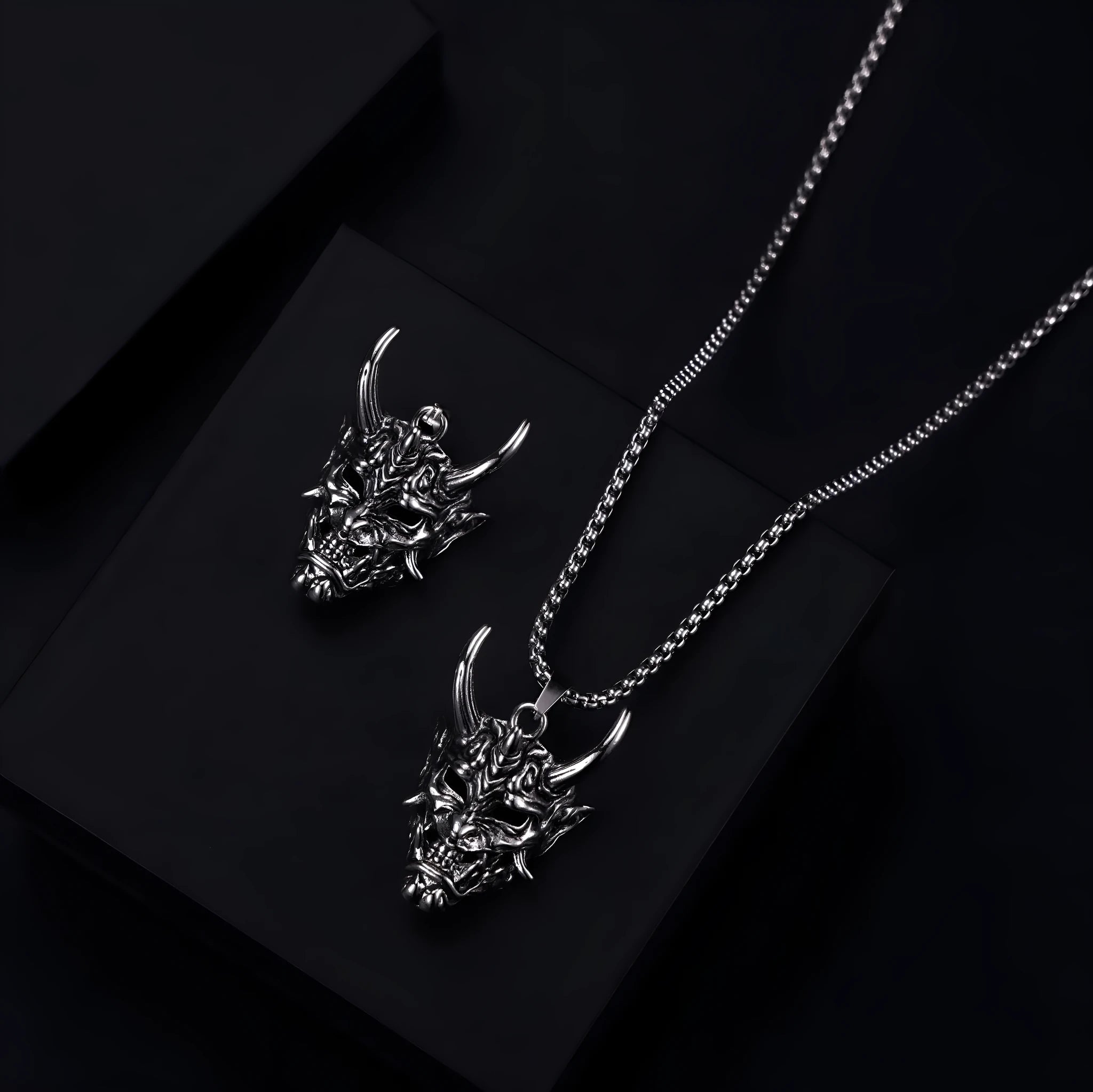 Men's silver electroplated zinc alloy pendant necklace measuring 40mm wide by 27mm high