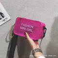 Transparent square women's shoulder bag in jelly material with a diagonal cross strap, showing internal mobile phone pocket.