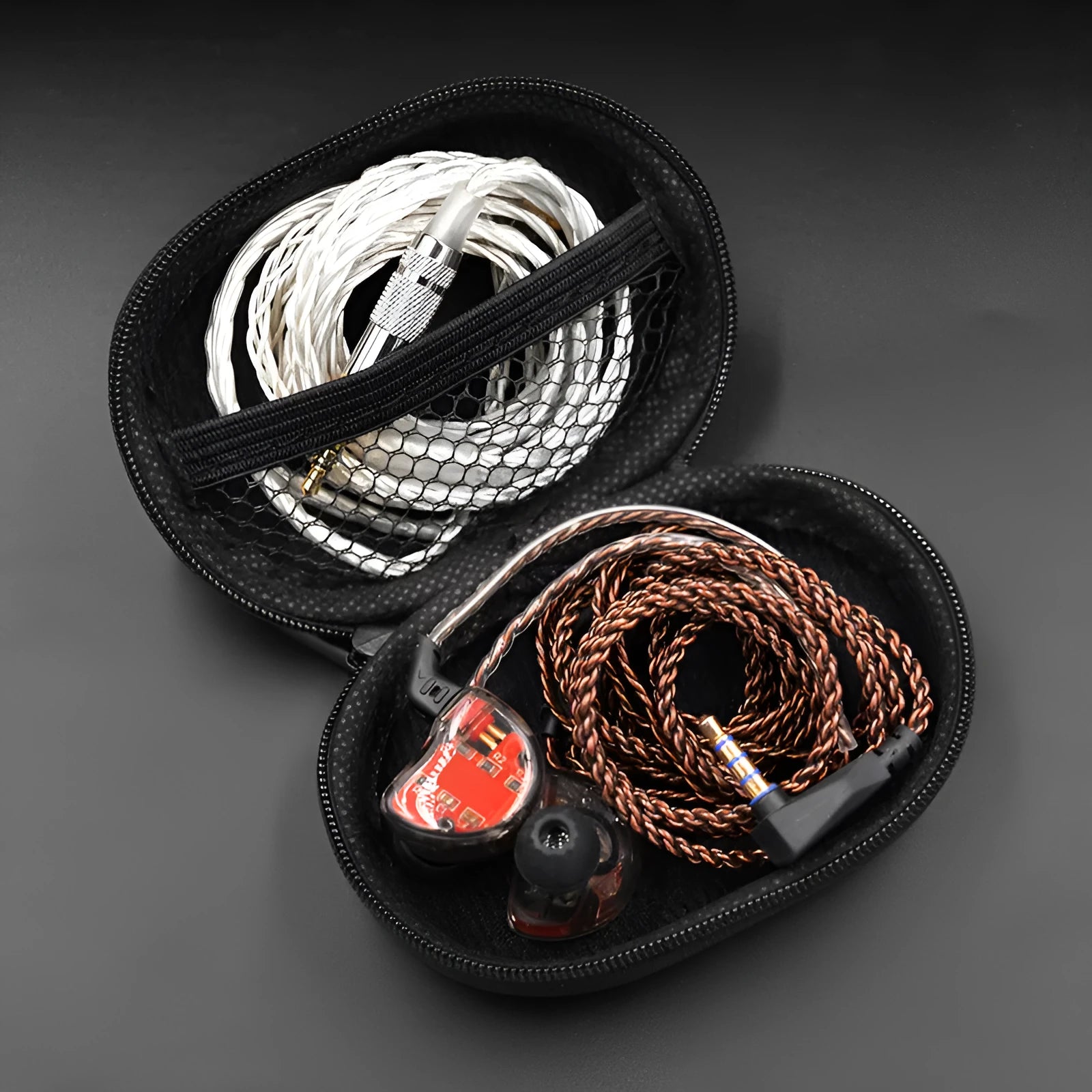 Black oval leather earphone storage bag for portable audio device protection