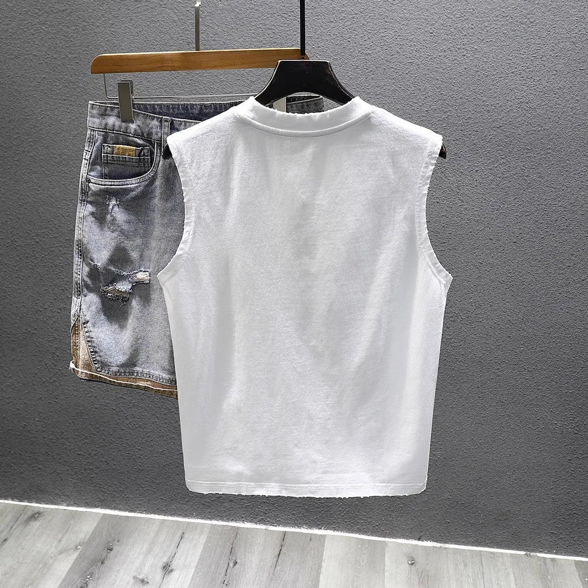 Cotton sleeveless t-shirt in loose fit with straight hem design in black or white colours
