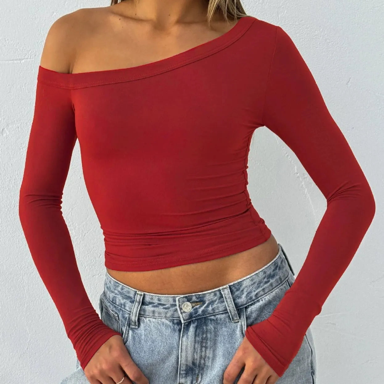 Women's slim fit knitted cardigan in solid colour with long sleeves and shoulder strap detailing