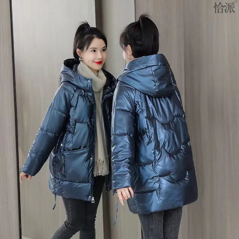 A women's loose-fitting thick hooded winter jacket in an acrylic polyester fabric.