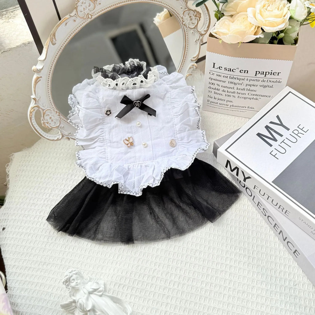 White polyester waltz gauze skirt costume on a small dog, showing princess style and lightweight fabric.