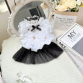 White polyester waltz gauze skirt costume on a small dog, showing princess style and lightweight fabric.