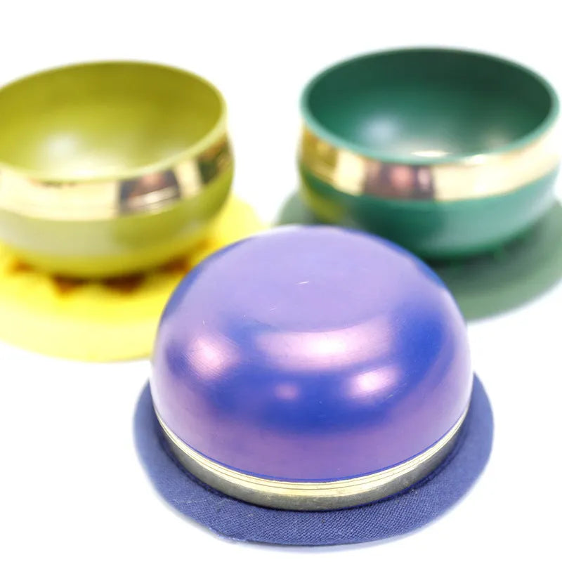 Handmade Himalaya singing bowl in one of seven colours: orange red, green, blue, sky blue, purple, yellow, or red
