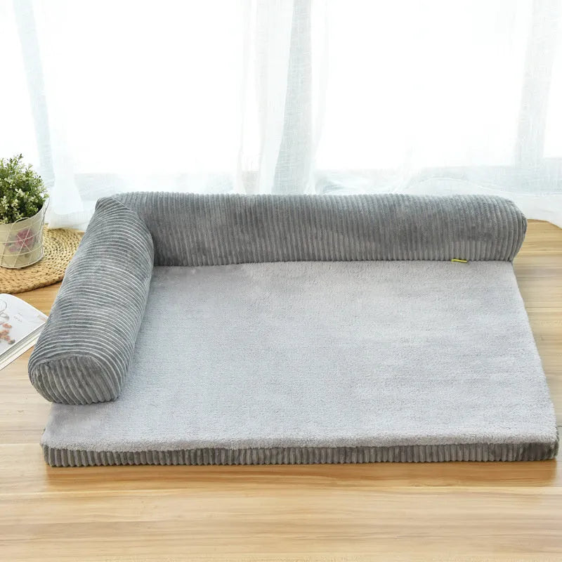 Corduroy bolster dog bed with non-slip base in grey, showing S M L XL size comparison.