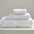 3-piece pure cotton towel set with square, hand, and bath towel in assorted colours