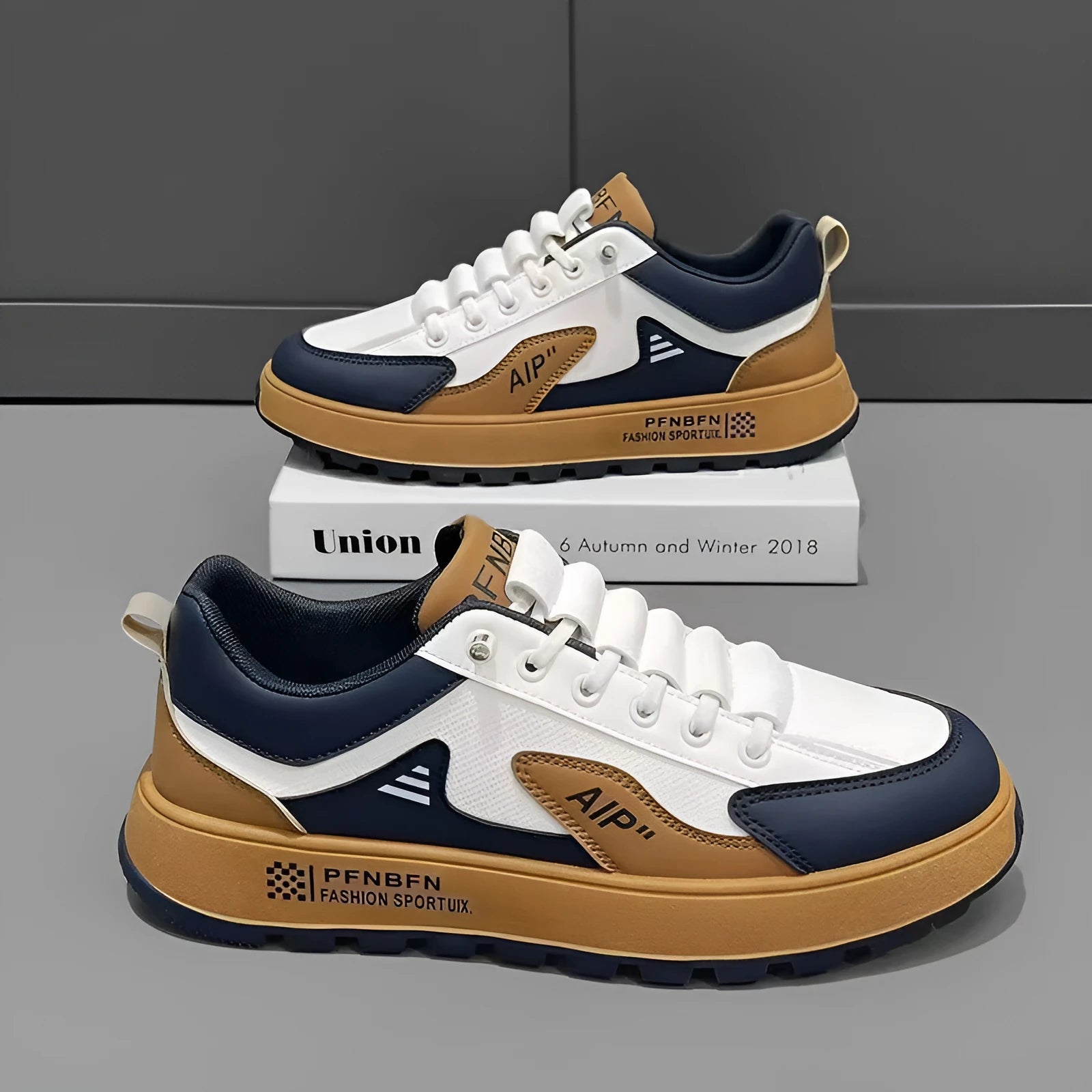 Men's white and black casual sports shoes with round toe, made from artificial PU.