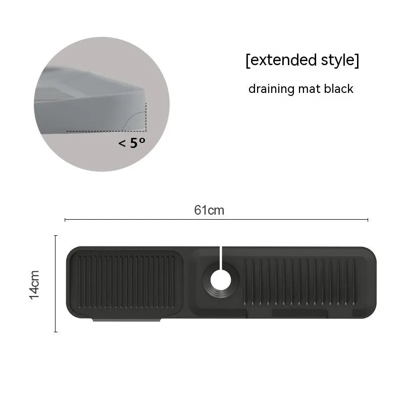Silicone faucet splash guard pad in sloped design with drain channels on kitchen sink